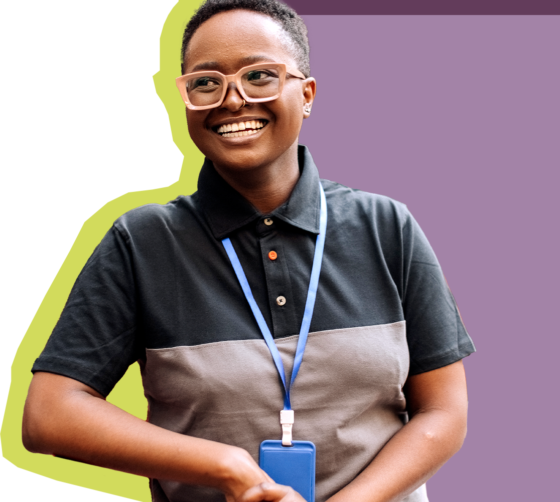 Photo of smiling tech professional with company badge
